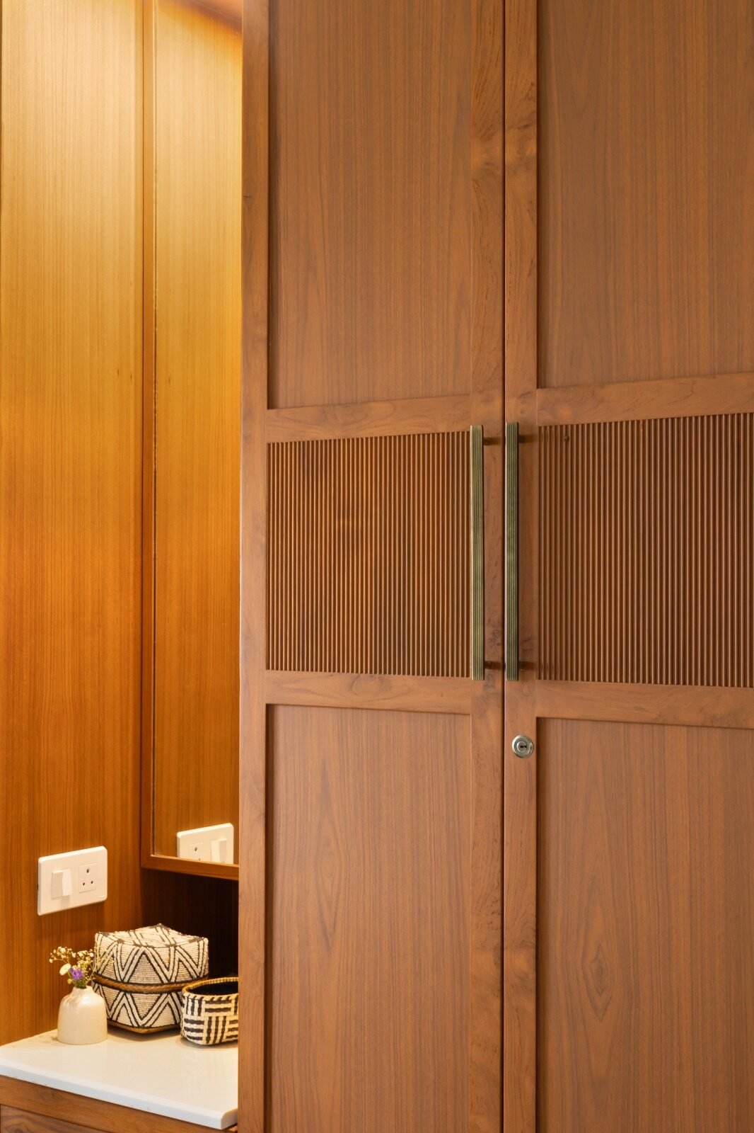 Wardrobe finished with natural cane and glass detailing