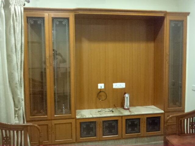 Teak wall display unit with glass-fronted side cabinets